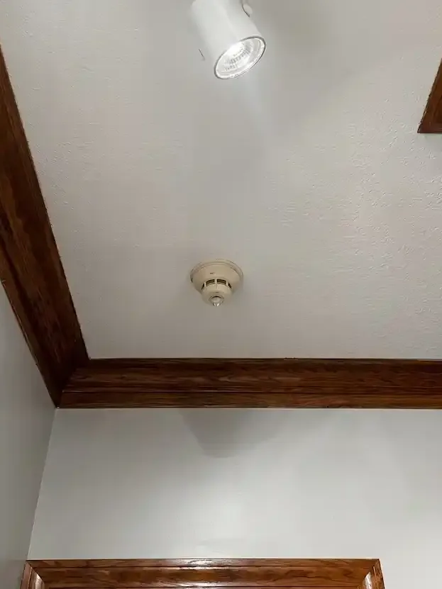 Drywall hole repair after texture match in Kansas City home