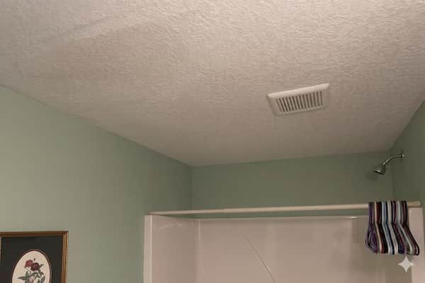 Ceiling after popcorn removal — clean smooth finish
