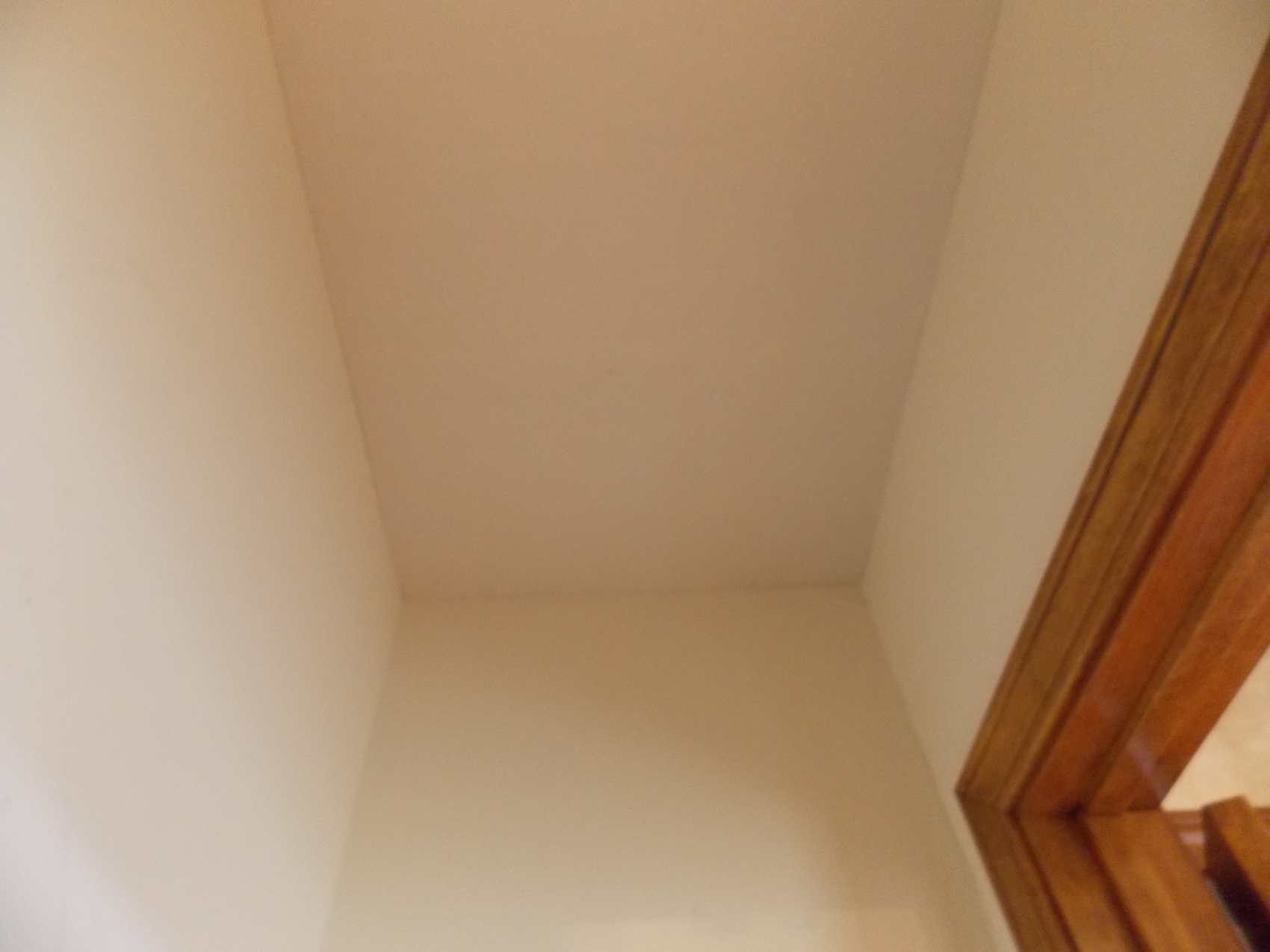 Drywall and plaster repair specialist working in a Raytown, MO area home