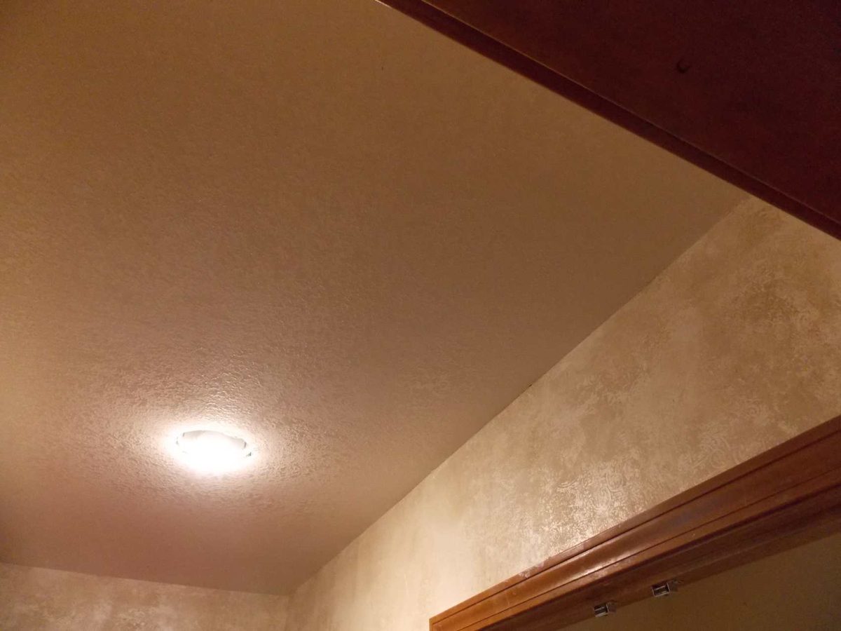 Drywall texture matching being applied by a Patch-It-Now specialist in a Lee's Summit, MO home